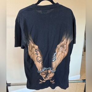 Edgy Black Graphic Tee with Handcuff Design